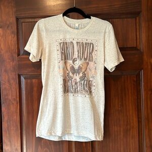 T-shirt with cute butterfly print. Cream with brown specs